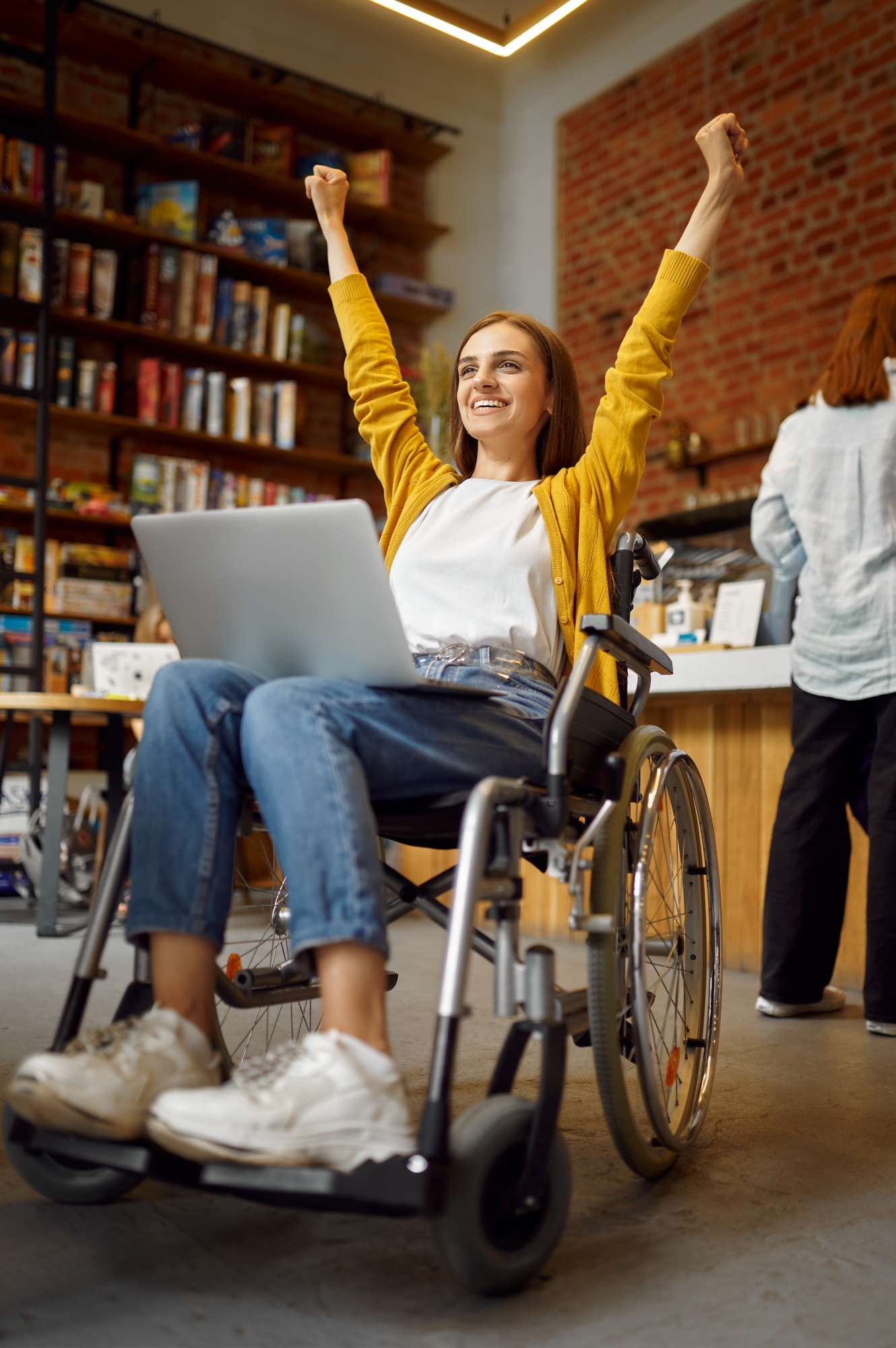 Cheerful female student in wheelchair, disability